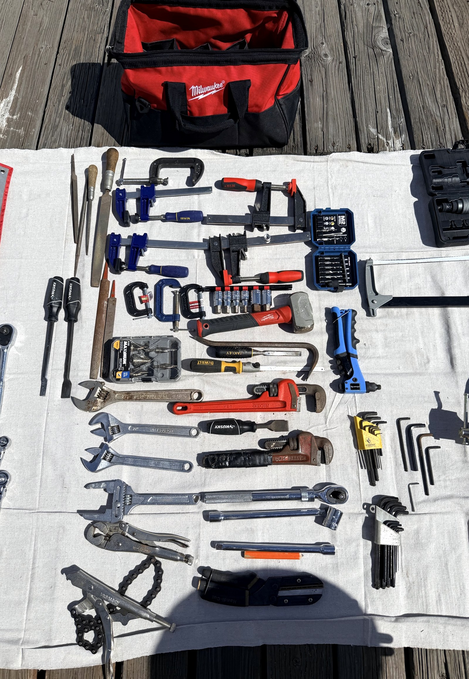 Tool Bag D — Electrical & Drills laid out on deck