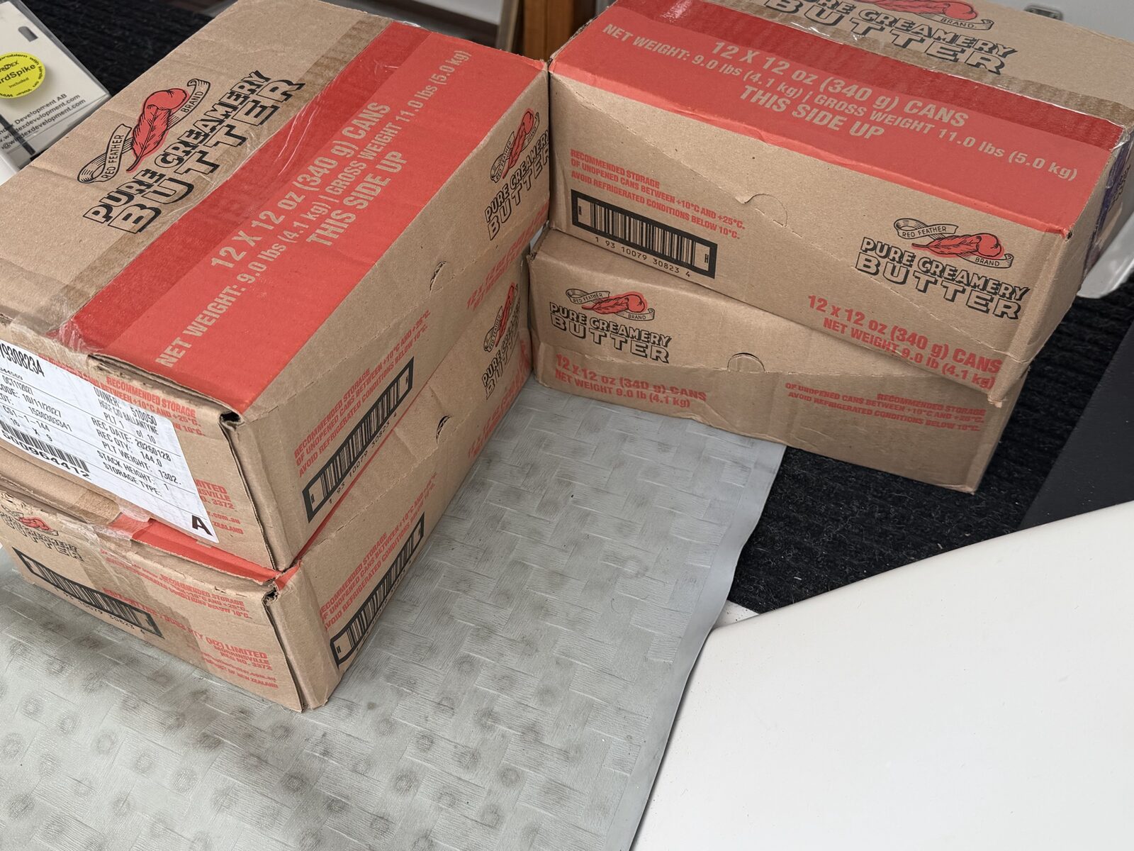 Cases of Red Feather Pure Creamery Butter from New Zealand