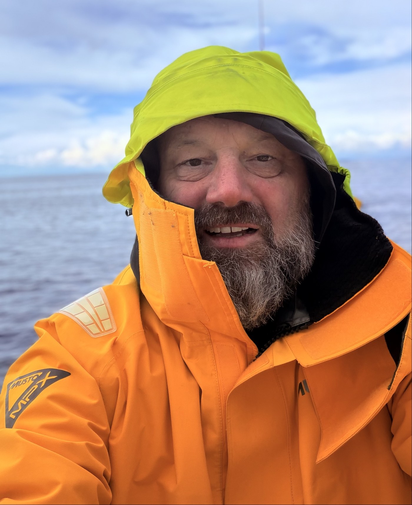 Marek (Mark) Hojsan in offshore foul-weather gear at sea